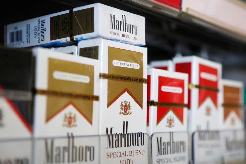© Reuters. 美股盘前:烟草商菲利普莫里斯大涨7% 取消与奥驰亚的合并谈判